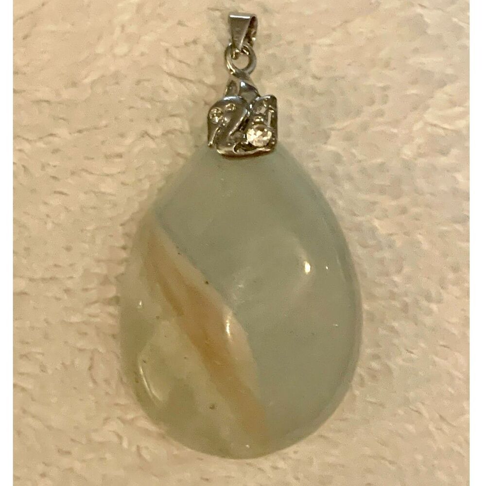 Green Stone Pendant with Silver Toned Loop Size 1 1/2" length X 1" wide